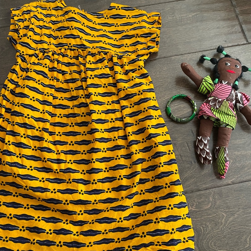 Dress and doll and bracelet